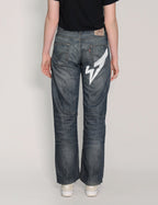 'Love Will Tear Us Apart' Jeans in Indigo.