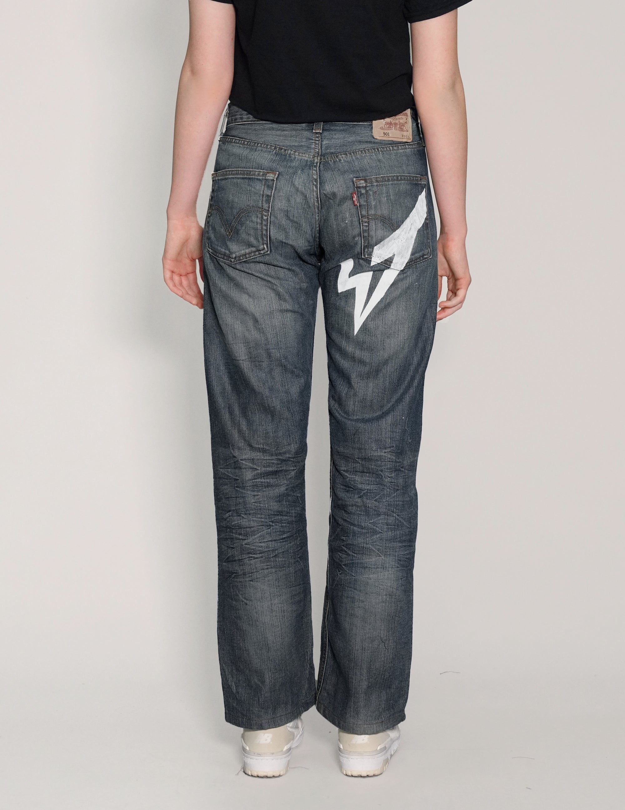 'Love Will Tear Us Apart' Jeans in Indigo.