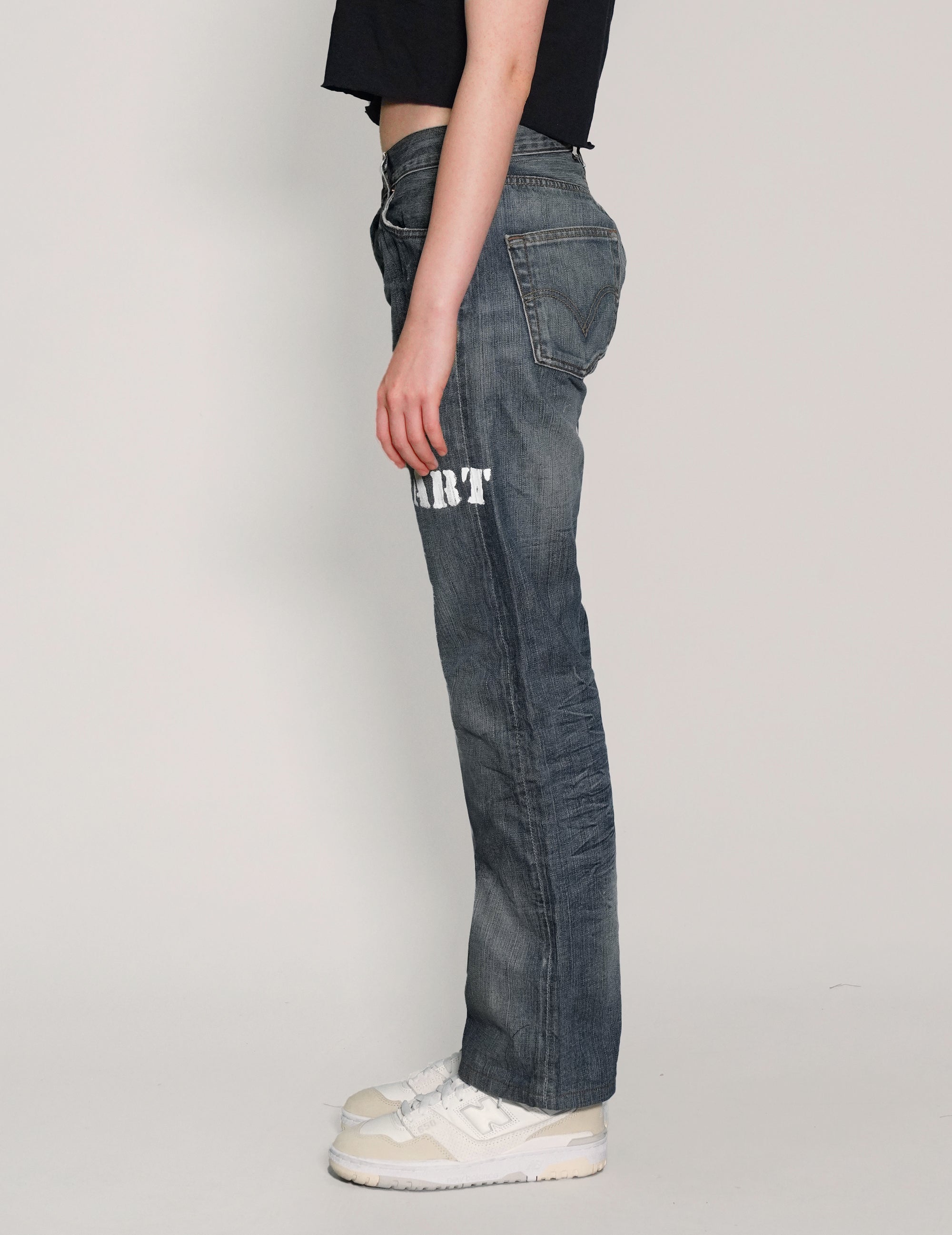 'Love Will Tear Us Apart' Jeans in Indigo.
