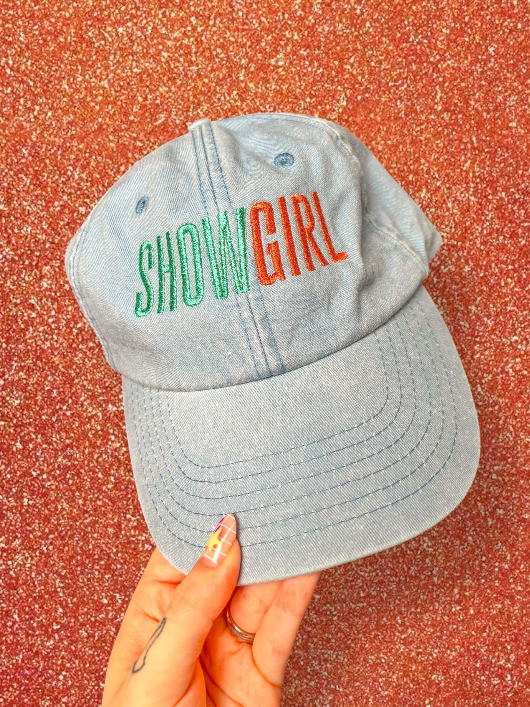 SHOWGIRL embroidered baseball cap.