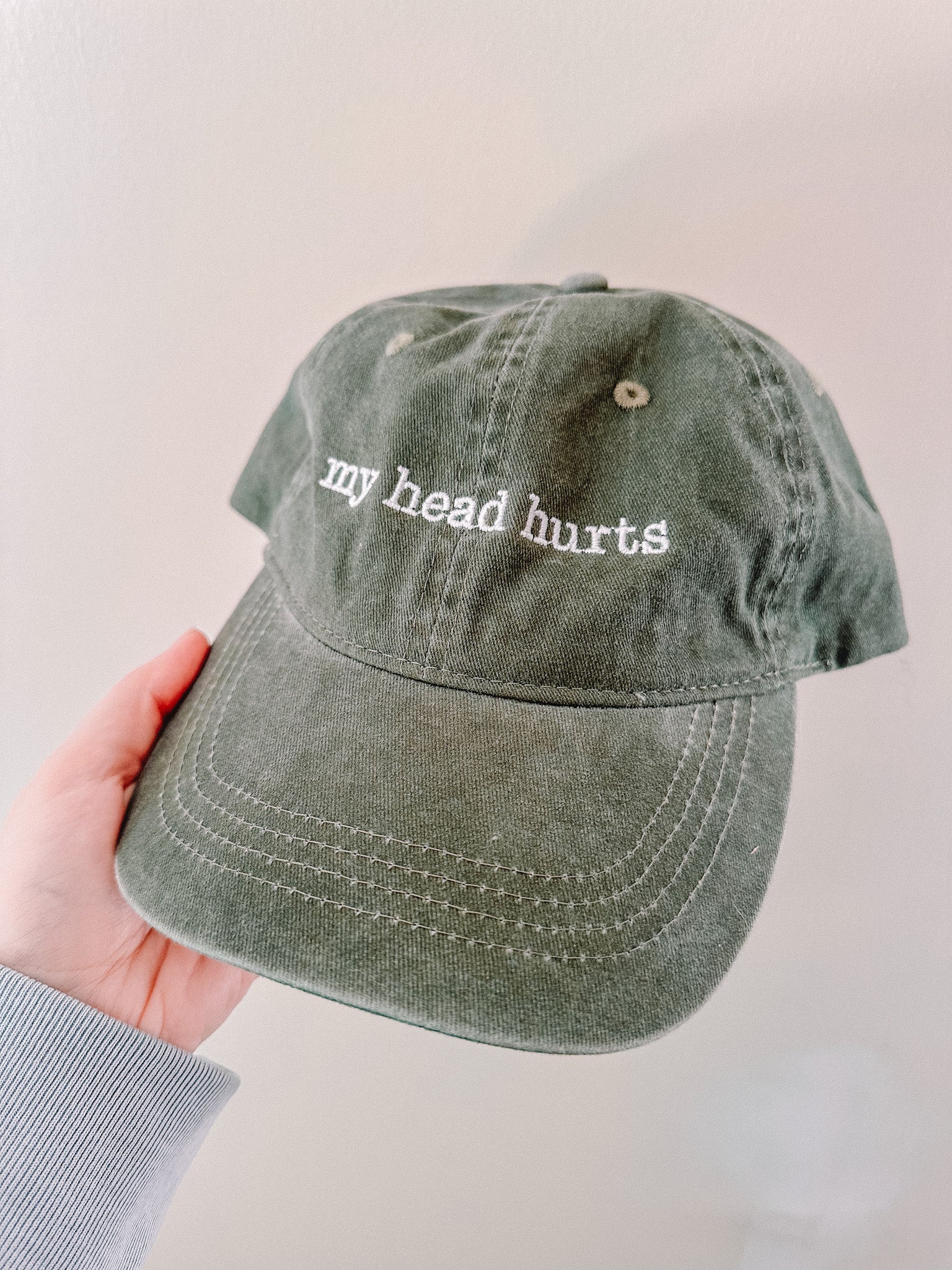 My Head Hurts embroidered baseball cap.
