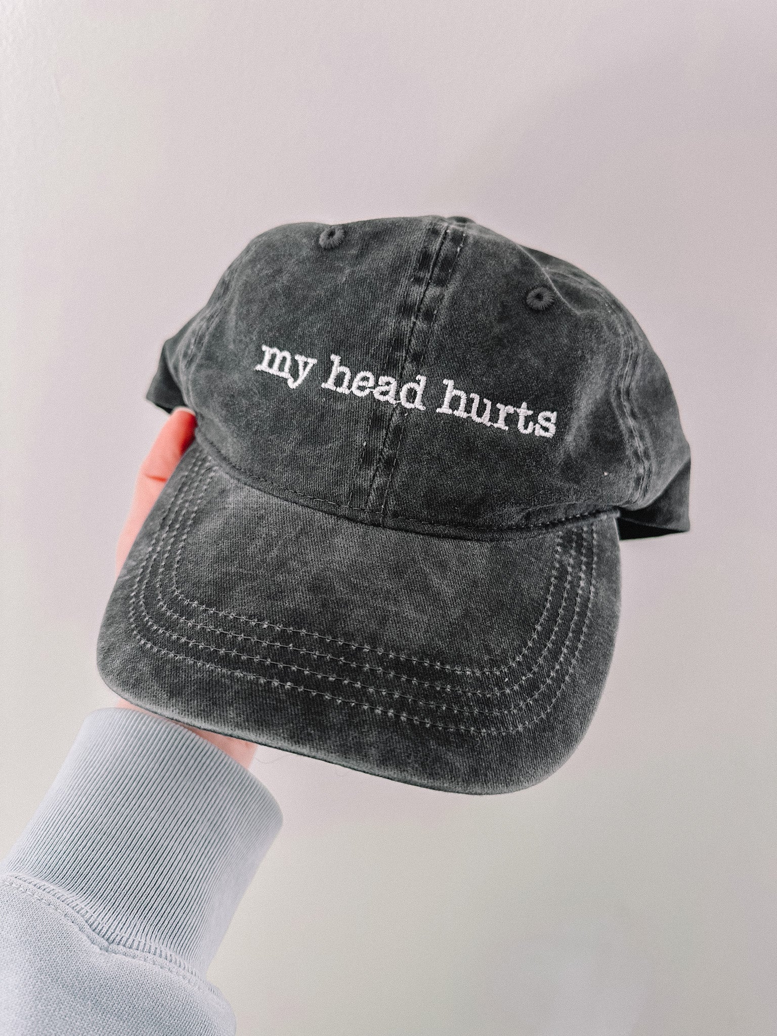 My Head Hurts embroidered baseball cap.