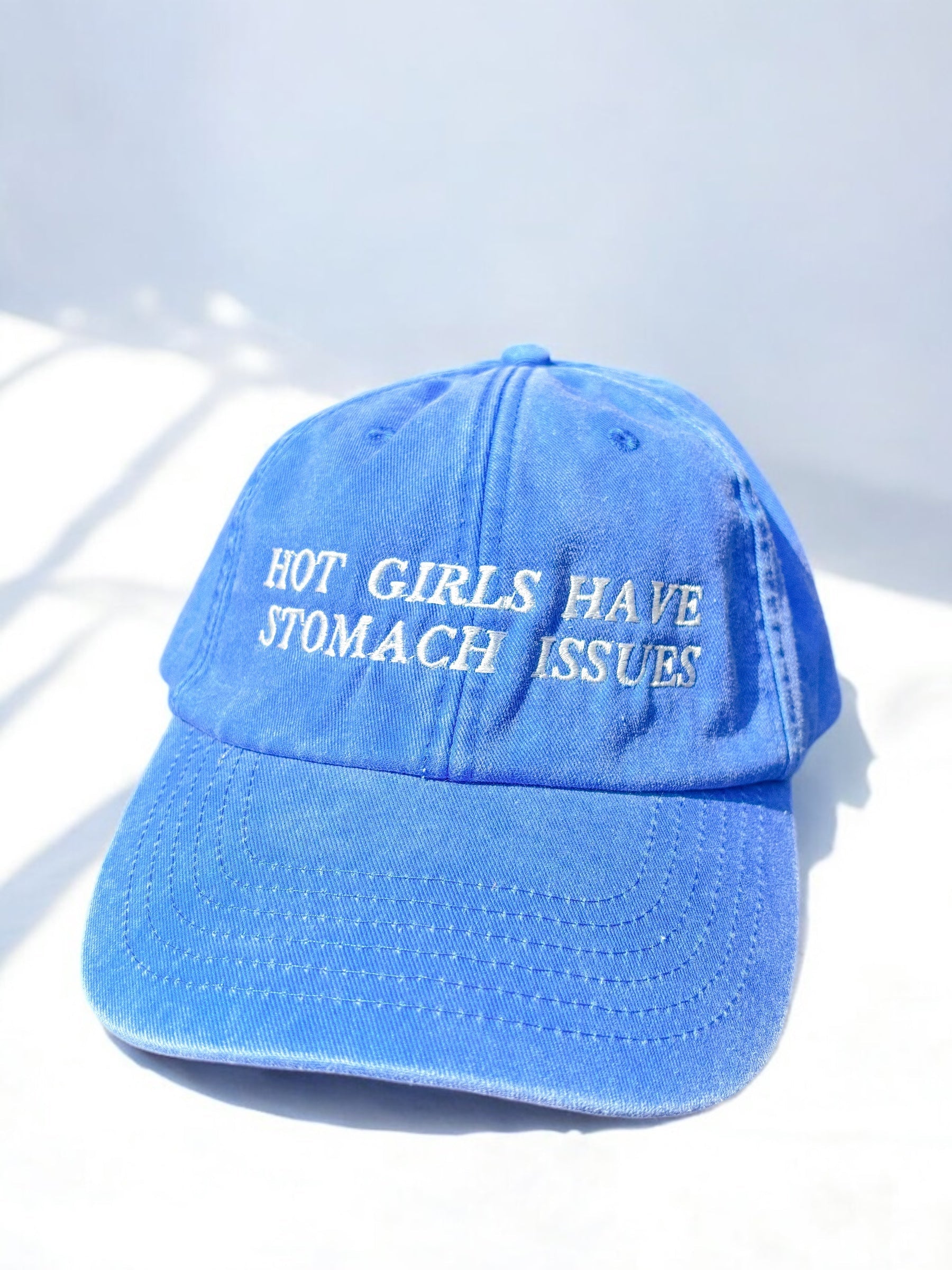 Hot Girls Have Stomach Issues embroidered baseball cap.